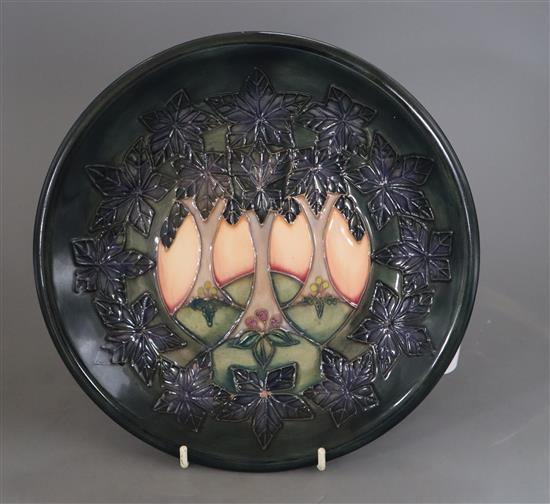 A Moorcroft Cluny plate designed by Sally Tuffin, diameter 26cm